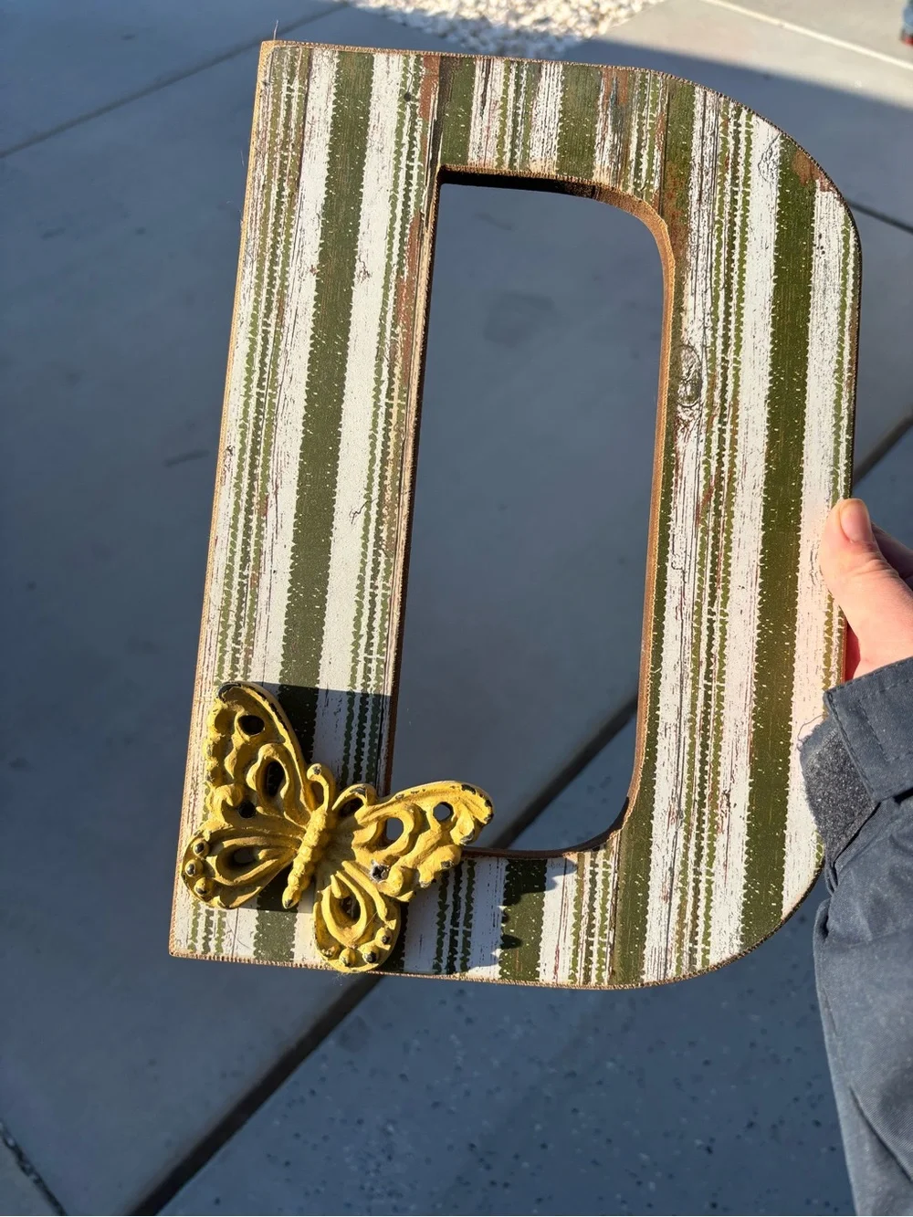 Striped Green and White Decorative Letter D with Yellow Butterfly Accent